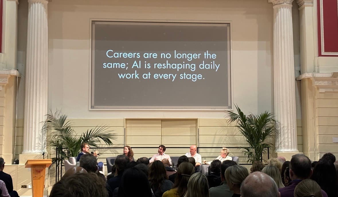 Nathan speaking on a packed AI panel about how AI is reshaping daily work