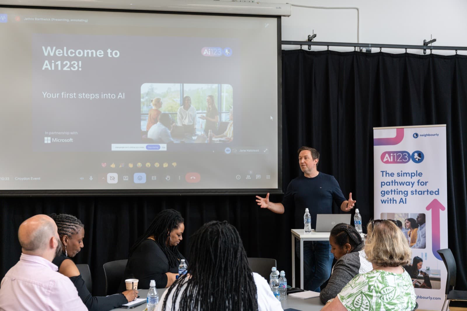 Nathan presenting the Ai123 pathway to a room in Croydon, in partnership with Neighbourly and Microsoft